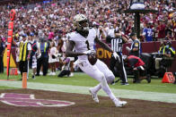 New Orleans Saints wide receiver Marquez Callaway scores a touchdown in the second half of an NFL football game against the Washington Football Team, Sunday, Oct. 10, 2021, in Landover, Md. (AP Photo/Julio Cortez)