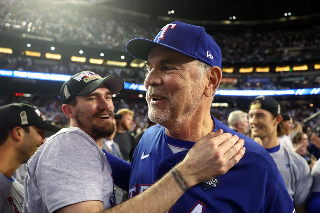 Texas Rangers manager Bruce Bochy (15) celebrates with his team after winning the 2023 World Series in five games against the Arizona Diamondbacks on Nov. 1, 2023, at Chase Field in Phoenix, Arizona.