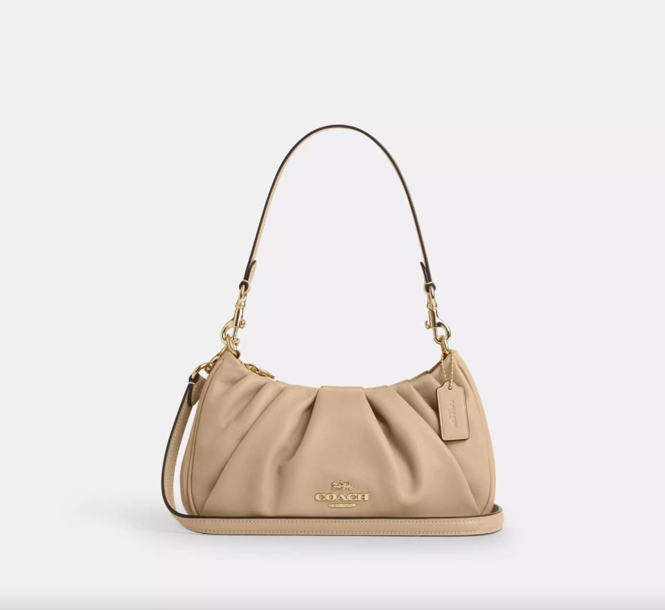 Teri Shoulder Bag With Ruching in light tan (Photo via Coach Outlet)