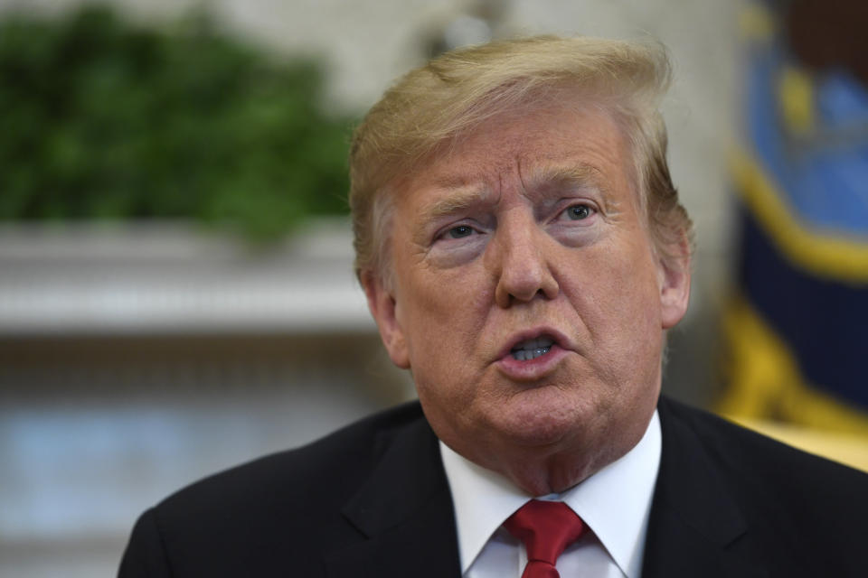 FILE - In this March 27, 2019, file photo, President Donald Trump speaks in the Oval Office of the White House in Washington. Top officials in the White House were aware in early 2019 of classified intelligence indicating Russia was secretly offering bounties to the Taliban for the deaths of Americans, a full year earlier than has been previously reported, according to U.S. officials with direct knowledge of the intelligence. The assessment was included in at least one of Trump’s written daily intelligence briefings at the time, according to the officials. (AP Photo/Susan Walsh, File)