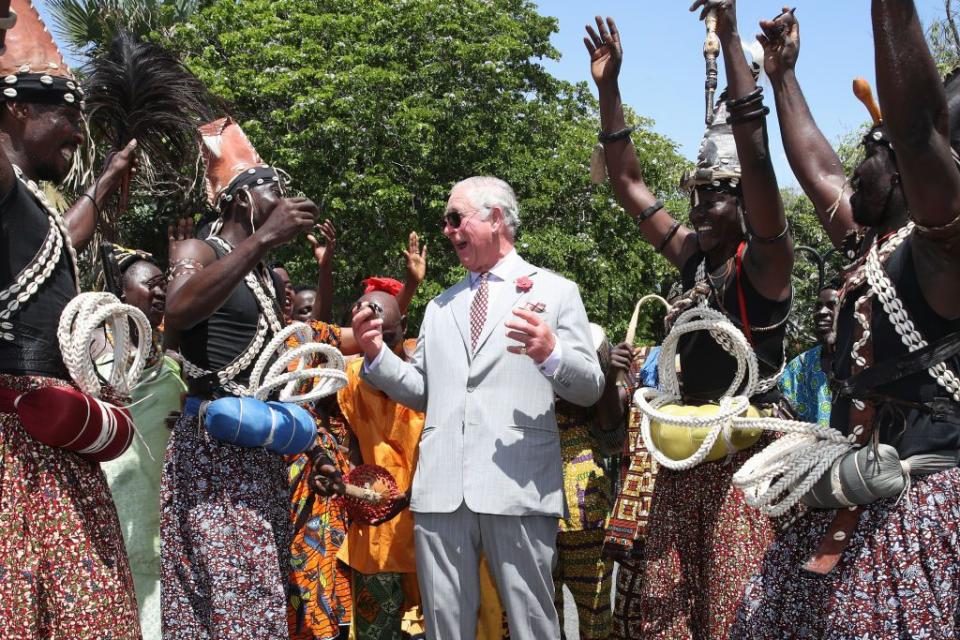 <p>The Prince of Wales is greeted at Christianborg Castle by a group of traditional dancers. The castle was built in the 17th century and used as a Danish slave trade fort. While at the site, Prince Charles heard of plans for its upcoming restoration into a museum. </p>