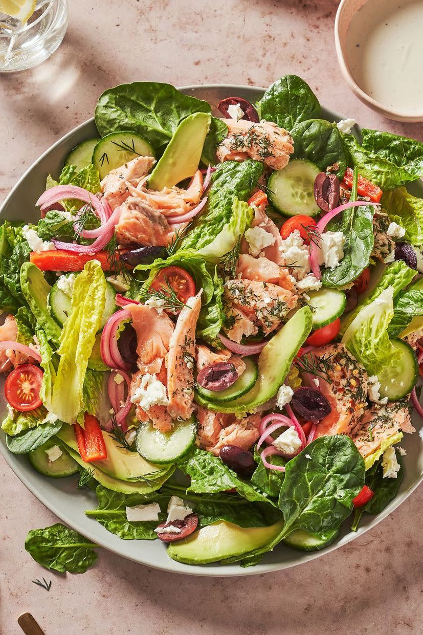 <p>Whenever we're craving a salad (or just know we should be eating more of them), we want something super fresh and crisp with lots of flavor. Cue this hearty salad, which is easy enough to throw together for lunch but filling enough to satisfy at dinnertime. While the <a href="https://www.delish.com/cooking/g2039/salmon-recipes/" rel="nofollow noopener" target="_blank" data-ylk="slk:salmon;elm:context_link;itc:0;sec:content-canvas" class="link ">salmon</a> is cooking, chop your veggies—it'll all come together in less than 30 minutes.<br><br>Get the <strong><a href="https://www.delish.com/cooking/recipe-ideas/a35843146/greek-salmon-salad-recipe/" rel="nofollow noopener" target="_blank" data-ylk="slk:Greek Salmon Salad recipe;elm:context_link;itc:0;sec:content-canvas" class="link ">Greek Salmon Salad recipe</a></strong>.</p>