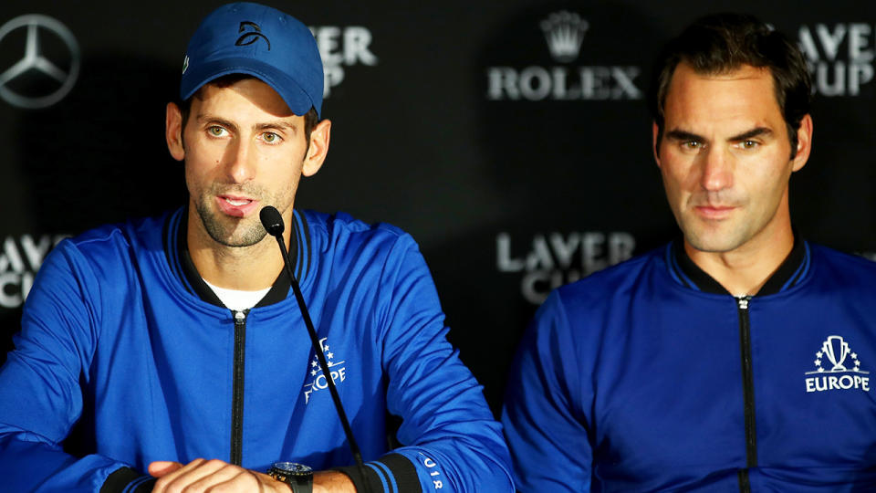 Novak Djokovic, pictured here speaking to the media alongside Roger Federer at the Laver Cup in 2018. 