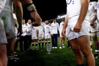 Rugby Union - Rugby Test - England v Australia's Wallabies - Sydney, Australia - 25/06/16. England players stand around the Cook Cup trophy as they celebrate defeating Australia. REUTERS/David Gray