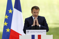 French President Emmanuel Macron delivers his speech during a meeting with members of the Citizens' Convention on Climate to discuss over environment proposals at the Elysee Palace in Paris, Monday, June 29, 2020. French President Emmanuel Macron, who once declared "Make The Planet Great Again" but whose climate agenda got knocked off course by persistent street protests, is under new pressure to fight climate change after the Green Party did well in Sunday's local elections. (Christian Hartmann/Pool via AP)