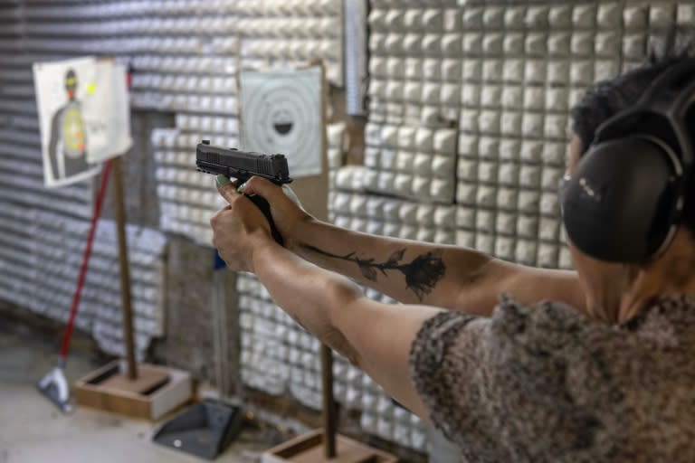 The number of Israeli women with gun permits, such as Limor Gonen, has more than tripled since the start of the war in Gaza (MENAHEM KAHANA)