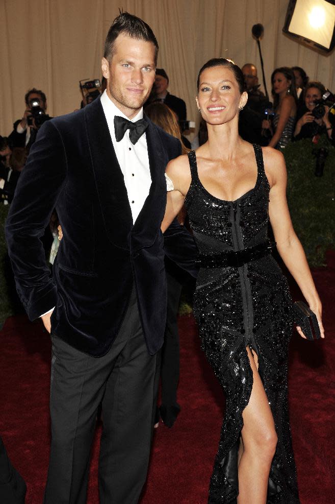 Tom Brady and Gisele Bundchen arrive at the Metropolitan Museum of Art Costume Institute gala benefit, celebrating Elsa Schiaparelli and Miuccia Prada, Monday, May 7, 2012 in New York. (AP Photo/Charles Sykes)