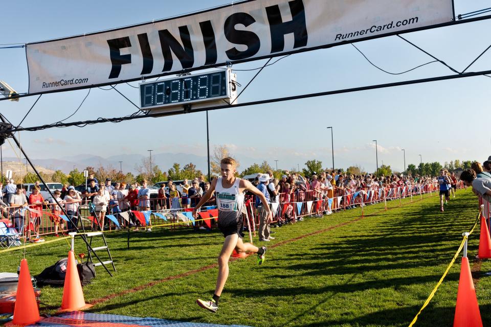 Canyon View’s Thomas Daniels crosses the finish line in the 3A state high school cross-country championships at the Regional Athletic Complex in Salt Lake City on Tuesday, Oct. 24, 2023. The Canyon View boys team took first. | Megan Nielsen, Deseret News