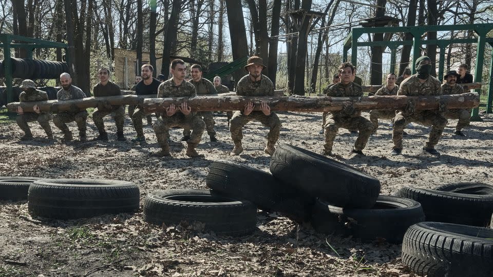 Young recruits undergo military training at a recruiting center in Kyiv in April. - Libkos/Getty Images