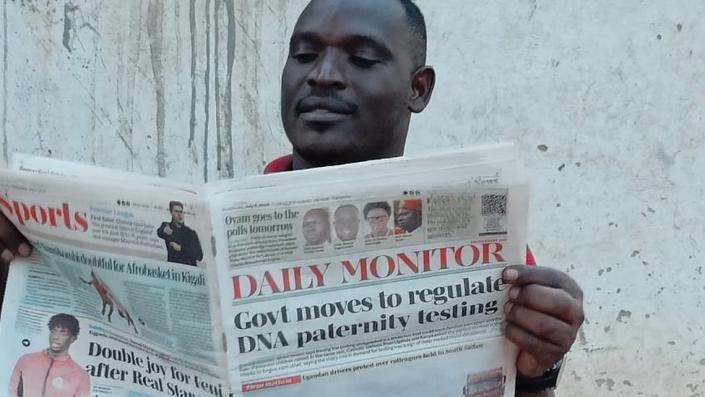 Man reading newspaper