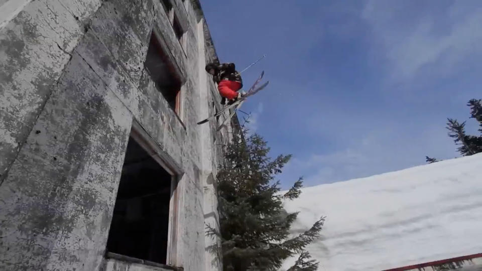 PIC FROM CATERS NEWS - (PICTURED; Logan Imlach jumping out of the building) Most people prefer to ski on big snowy slopes, but as this jaw dropping video shows, Logan Imlach is no ordinary Skiier. Shot in Alaska by native Matt Wild, the two minute clip shows Logan skiing through a five floor tower block navigating the winding staircases and even jumping out of windows. Both Matt and Logan work in an oil field, where they work the same three week shift. SEE CATERS COPY.
