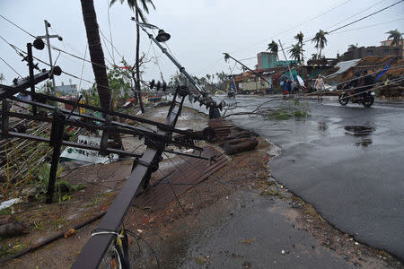 Fallen utility poles are pictured after Cyclone Fani hit Puri, in the eastern state of Odisha, India, May 3, 2019. REUTERS/Stringer