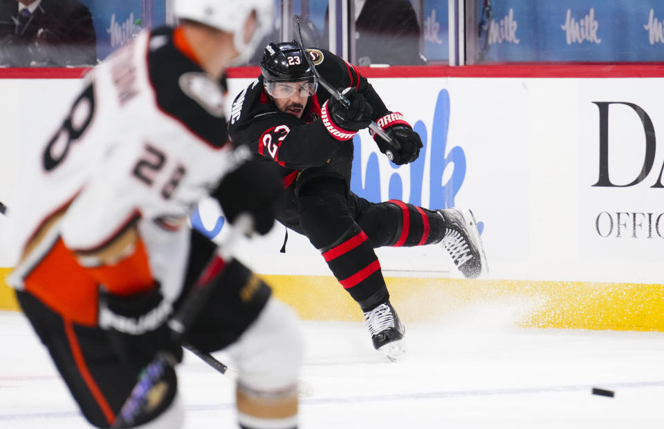 Ottawa Senators defenseman Travis Hamonic (23) shoots against the Anaheim Ducks during the second period of an NHL hockey game Thursday, Feb. 15, 2024, in Ottawa, Ontario. (Sean Kilpatrick/The Canadian Press via AP)