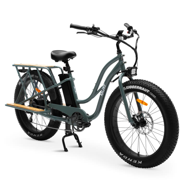 <p>Murf Electric Bikes</p>Murf Alpha Cargo<ul><li>Battery Power: 1040 Wh</li><li>Motor Power: 750W</li><li>Range: 25-50 miles</li><li>Payload: 400 lbs</li><li>Class 2 (up to 20 mph with throttle)</li></ul><p>Unleash the Murf Alpha Cargo, a true powerhouse on two wheels! Fueled by a robust 52V 20A battery, it conquers hills with unparalleled climbing prowess and accelerates with a ferocity that's hard to match. That's a whopping 1040Wh of battery power, coupled with a dynamic 750W motor, making this cargo bike not just a mode of transport but a statement of strength.</p><p>But the Murf Alpha Cargo doesn't just flex its muscles—it illuminates the path ahead with an off-road style LED headlamp, ensuring safety even in the darkest conditions. With a range of 25-50 miles and a generous payload capacity of 400 lbs, this Class 2 e-bike, is your ultimate companion for both power and style, turning every ride into an adventure.</p>