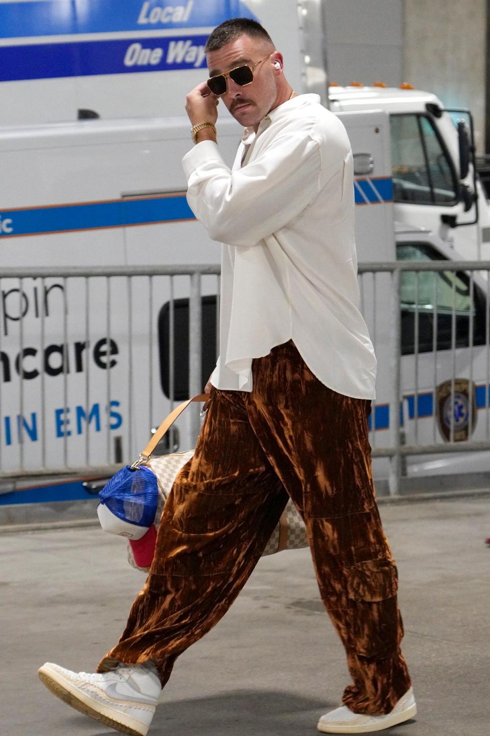 Fashion boy: Kelce's velvet parachute trousers steal the show (Getty Images)