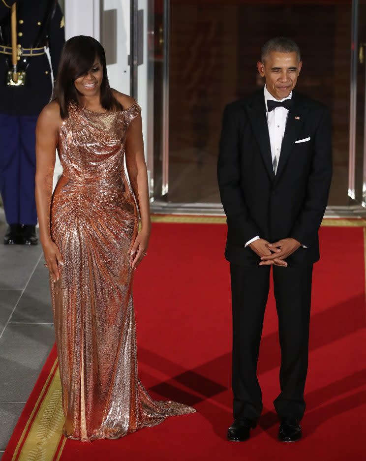 <i>Michelle chose a stunning Versace gown for her last ever state dinner [Photo: Getty]</i>