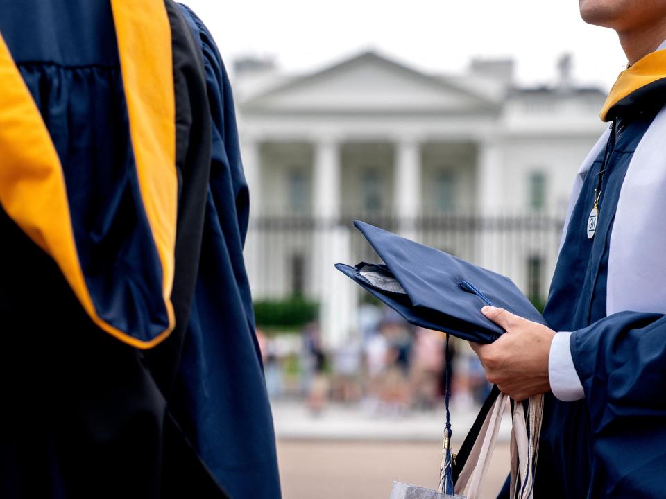 Graduate students in front of White House.