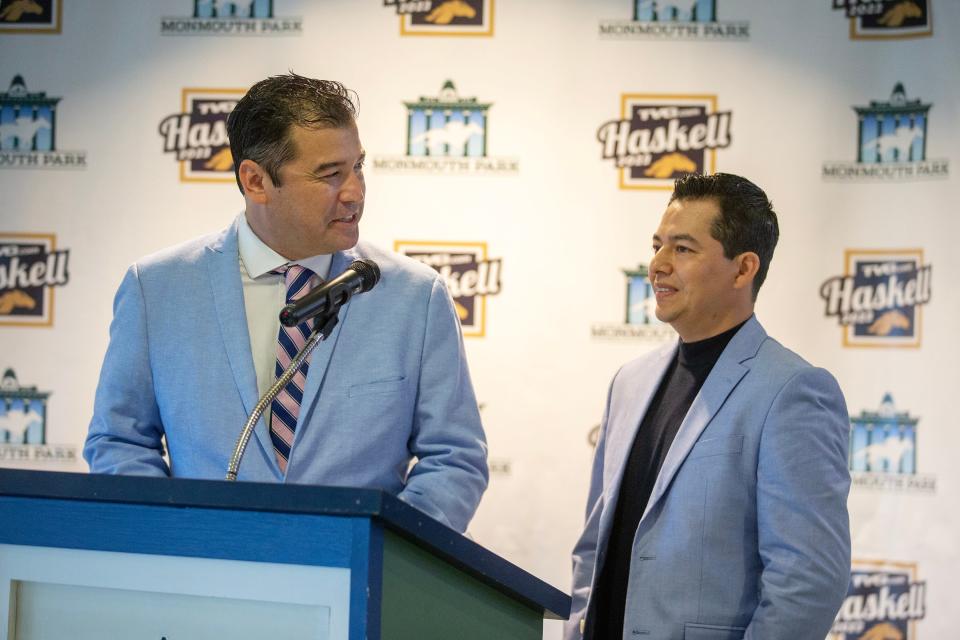 Chris Griffin, track announcer, interviews Jose Contreras, assistant trainer of Geaux Rocket Ride, during the post position draw for the TVG.com Haskell Stakes at Monmouth Park in Oceanport, NJ Wednesday, July 19, 2023.