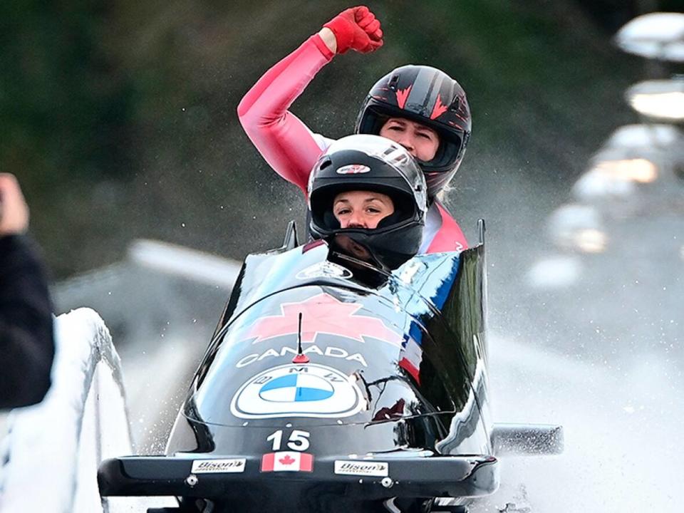 Christine de Bruin, front, and Kristen Bujnowski of Canada won four bronze medals on the 2-woman bobsleigh World Cup circuit this season and are confident of reaching the Olympic podium in Beijing in February. (Tobias Schwarz/AFP via Getty Images - image credit)