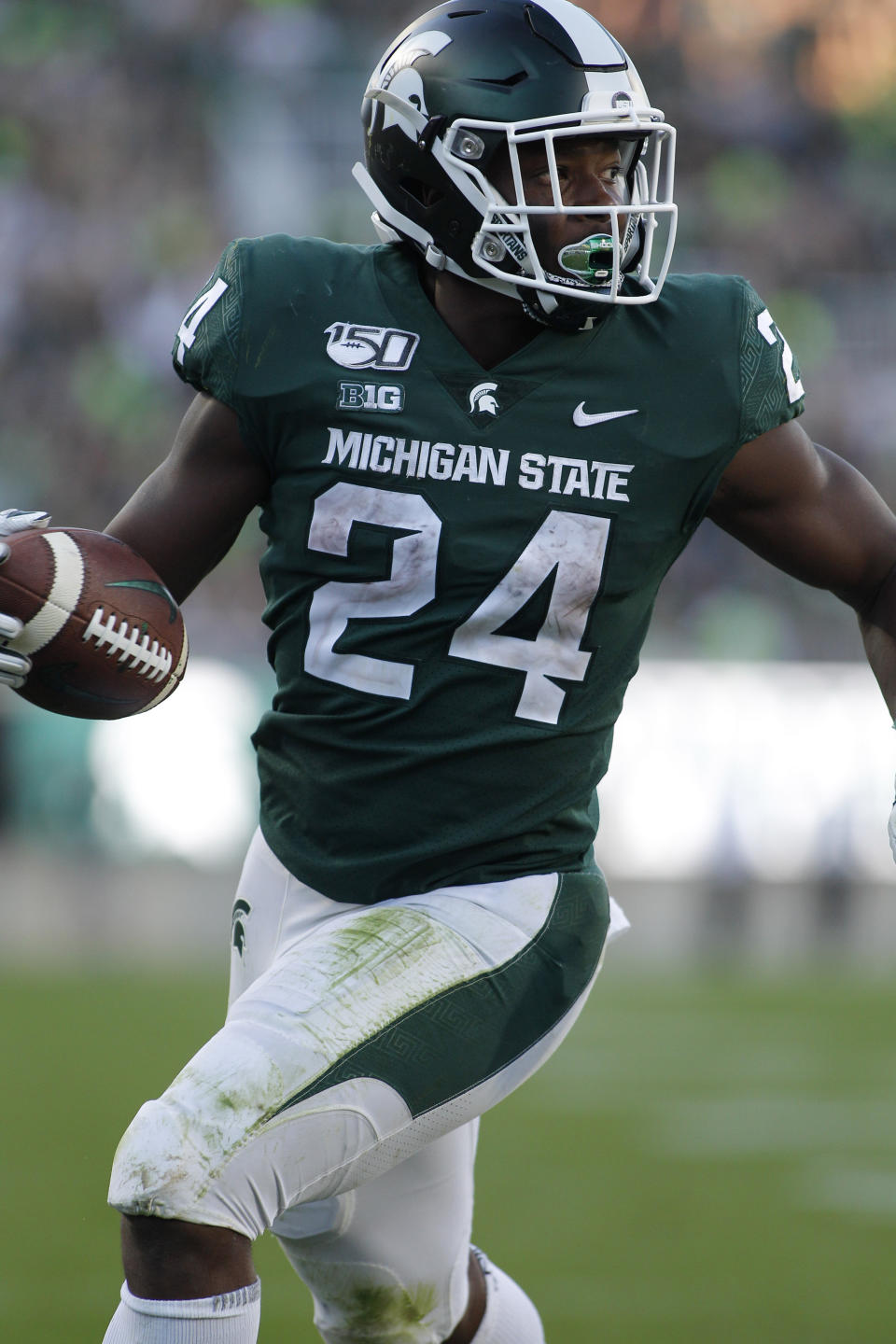 Michigan State's Elijah Collins rushes for a touchdown against Arizona State during the fourth quarter of an NCAA college football game Saturday, Sept. 14, 2019, in East Lansing, Mich. (AP Photo/Al Goldis)