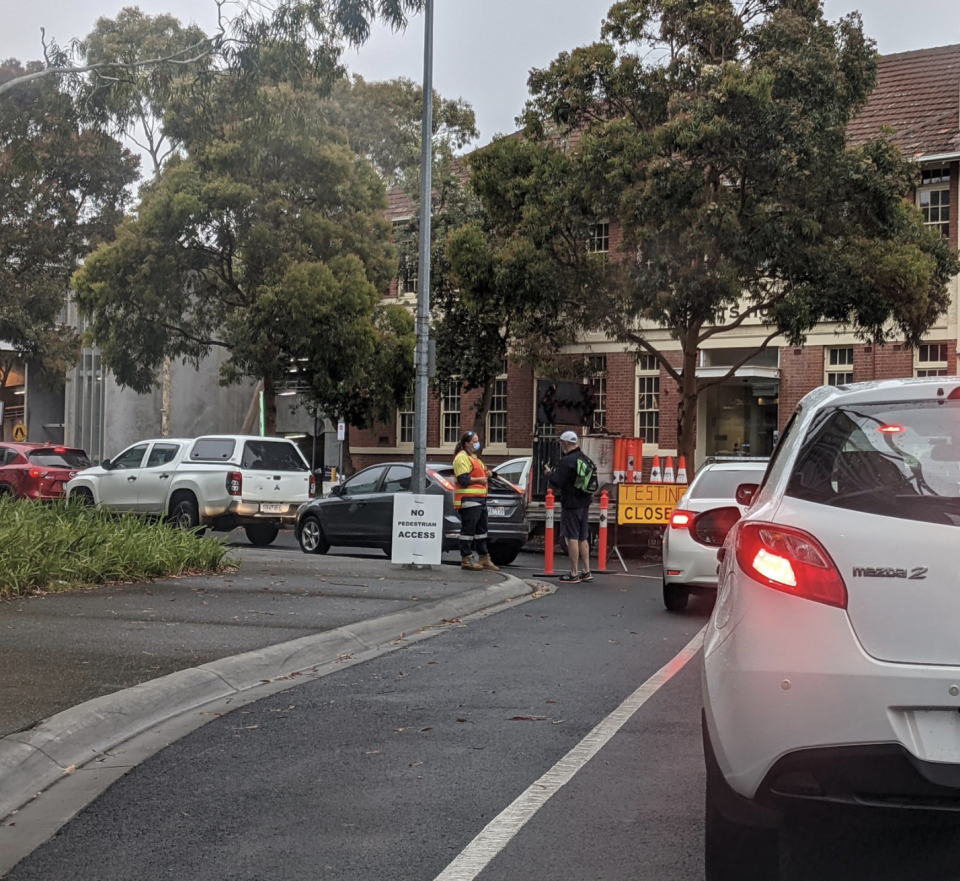 This was the scene from the Melbourne Sports Centre testing site that closed minutes after opening due to reaching capacity. Source: Twitter/TathamOddie 