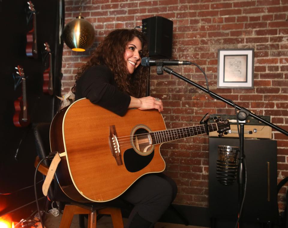 Nashville-based country music artist Tawnya Reynolds is shown performing at Downtownhecks Tap Room in Massillon in late March. Reynolds is a former contestant on u0022The Voiceu0022 reality television show.