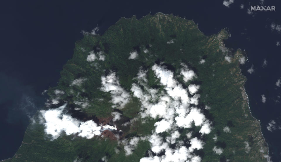 This image provided by Maxar Technologies shows La Soufriere volcano on the Caribbean island of St. Vincent, Thursday, April 8, 2021, the day before it erupted. (Satellite image ©2021 Maxar Technologies via AP)