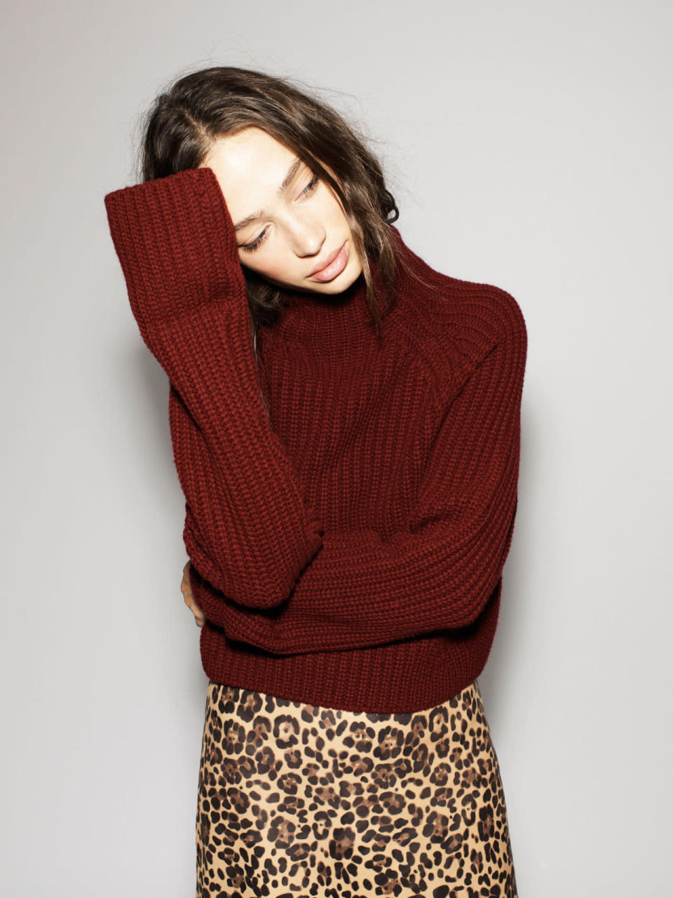 This Courrèges-inspired burgundy ribbed-knit sweater is one of many we can’t keep our hands off. 