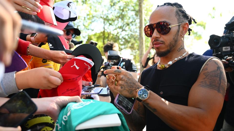 Lewis Hamilton Won’t Sign Your Ferrari F1 Cap Just Yet photo