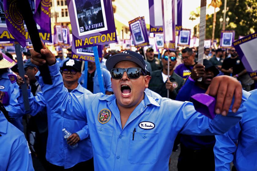 LOS ANGELES, CA - AUGUST 08: Los Angeles city workers, who are staging a one-day walkout to protest what they say are unfair labor practices by the city, gather at City Hall in downtown on Tuesday, Aug. 8, 2023 in Los Angeles, CA. Thousands of Los Angeles city workers hit the picket lines Tuesday for a massive one-day strike after union leaders accused the city of unfair labor practices, which Mayor Karen Bass and other officials denied. (Gary Coronado / Los Angeles Times)