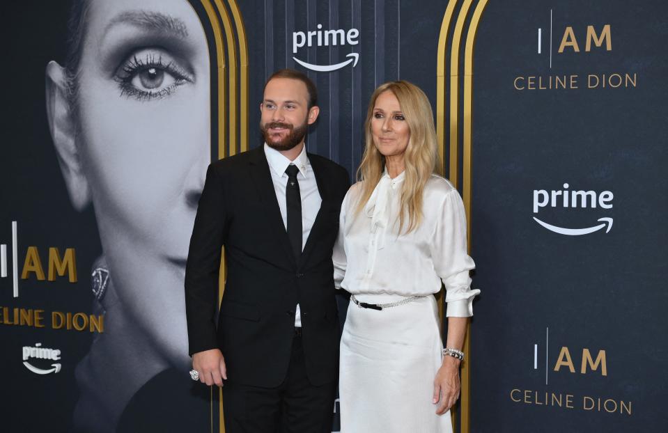Celine Dion, right, and son René-Charles Angélil pose together on the red carpet.