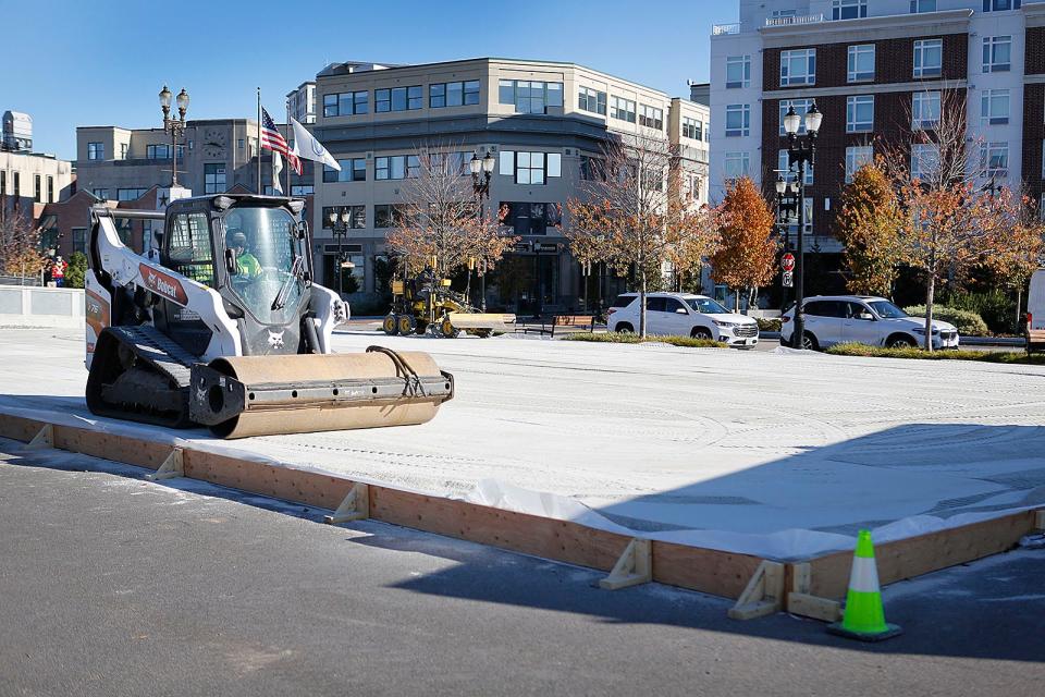 Crews work on a public ice rink at Generals Park off Hannon Parkway in Quincy on Thursday, Nov. 2, 2023.