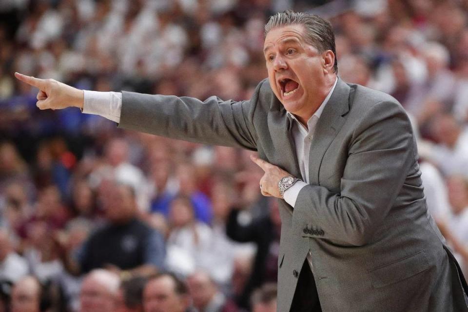 Kentucky Wildcats head coach John Calipari motions down court during a game against the Texas A&amp;M Aggies at Reed Arena in College Station, Texas, Wednesday, Jan. 19, 2022.