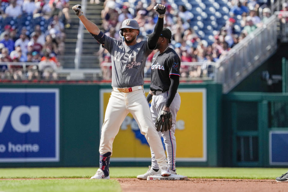 Washington Nationals' Luis Garcia Jr. (2), celebrates after hitting a double the third inning of a baseball game against the Miami Marlins at Nationals Park, Saturday, June 15, 2024, in Washington. (AP Photo/Jacquelyn Martin)