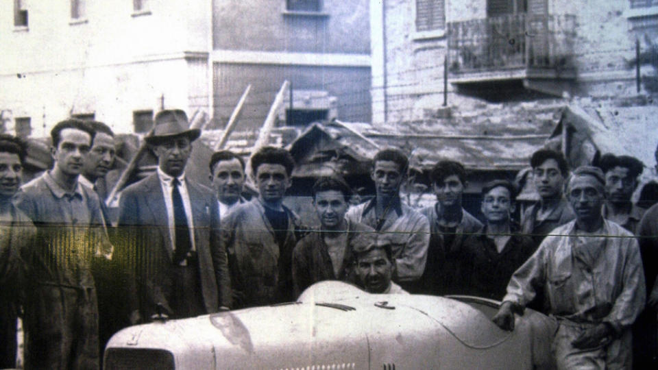 The Maserati brothers with a few of their employees, circa 1930