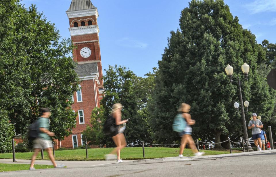 Clemson University students walk Tillman Hall on the first day fall classes on campus Wednesday, Aug. 24, 2022.