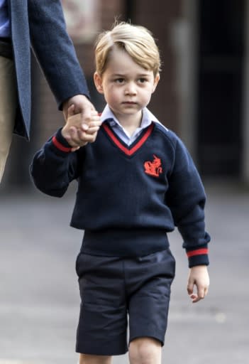 Prince George, seen here on his first day of school in London, will be one of four pageboys when his uncle Harry gets married on Saturday