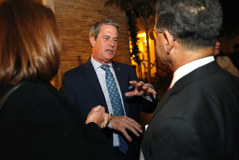 Sen. David Vitter, R-La., talks to supporters of Louisiana state treasurer John Kennedy, at Kennedy's election watch party, in Baton Rouge, La., Saturday, Dec. 10, 2016. Kennedy won the senate seat vacated by Vitter. (AP Photo/Gerald Herbert)