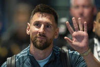 Argentina soccer player Lionel Messi waves to fans as he arrives to the Red Bull Arena for an international friendly soccer match against Jamaica on Tuesday, Sept. 27, 2022, in Harrison, N.J. (AP Photo/Eduardo Munoz Alvarez)