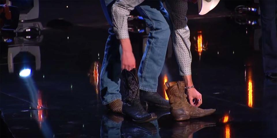 Colby Swift swaps out his old cowboy boots for the boots that American Idol judge Luke Bryan gifted to him