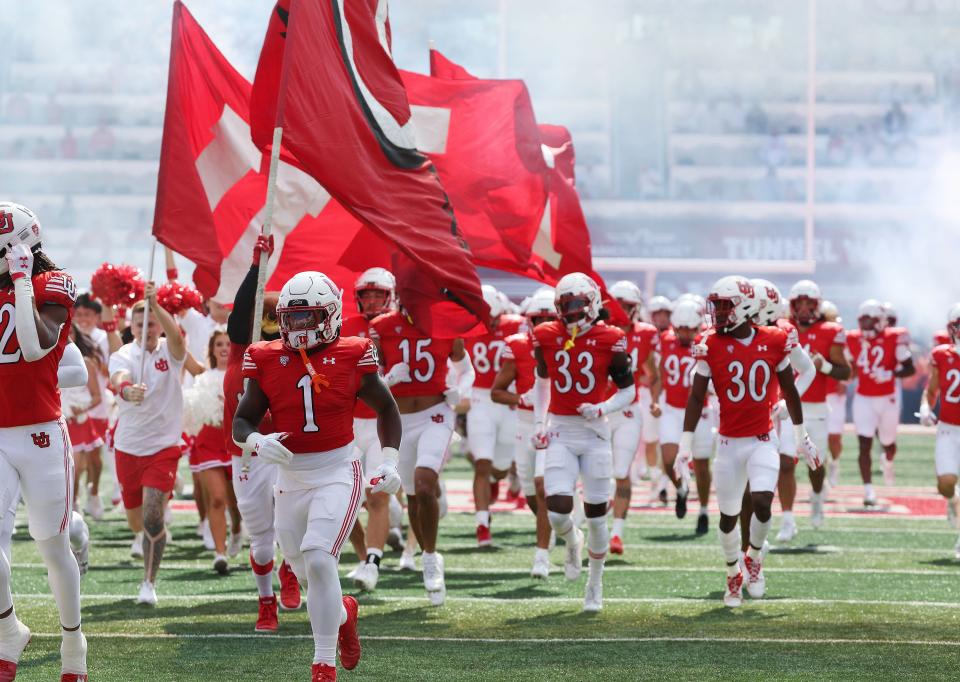 The Utah Utes take the field for a game against UCLA in Salt Lake City on Saturday, Sept. 23, 2023.