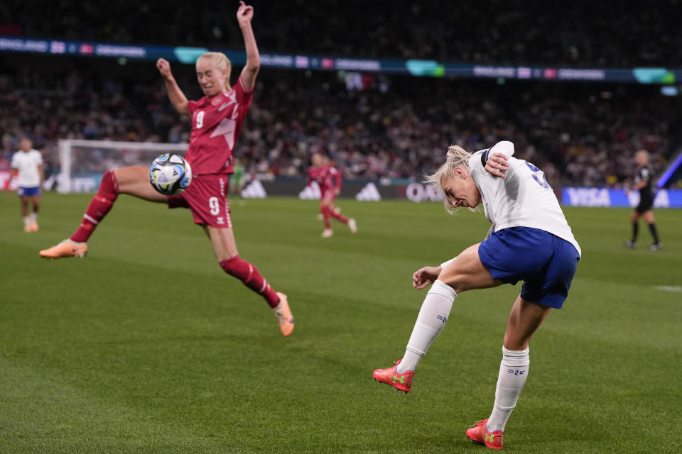 Denmark's Amalie Vangsgaard tries to block a shot by England's Rachel Daly during the Women's World Cup Group D soccer match between England and Denmark at the Sydney Football Stadium in Sydney, Australia, Friday, July 28, 2023. (AP Photo/Mark Baker)