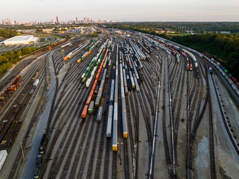 Freight train cars sit in a Norfolk Southern rail yard on Sept. 14 in Atlanta.