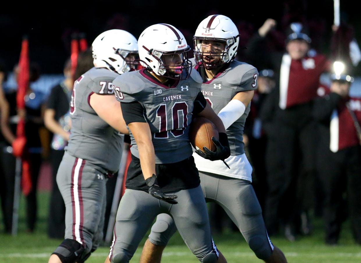 Mishawaka receiver Ethan Bryce (10) celebrates his touchdown during the Mishawaka vs. Warsaw football game Friday, Sept. 22, 2023, at Steele Stadium in Mishawaka.