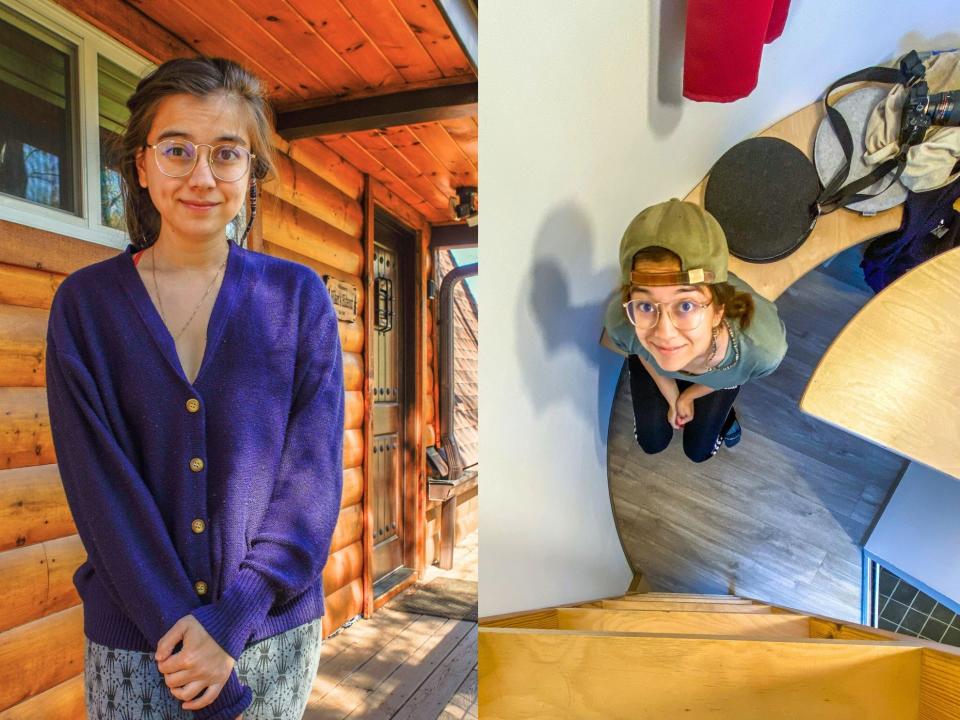 Left: The author in a navy sweater stands in front of a brown, wooden cabin. Right: The author looks up at a camera while sitting inside a tiny Airbnb with gray wood floors.