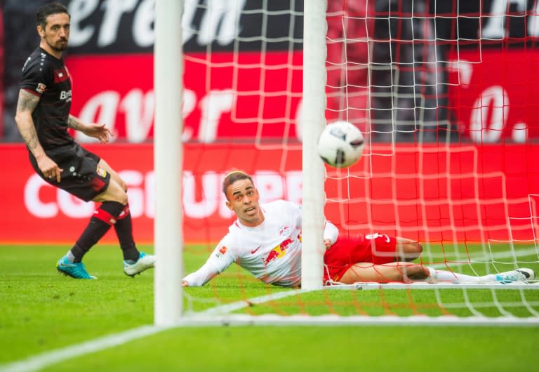 Leipzig's Yussuf Poulsen scores against Leverkusen in Leipzig, on April 8, 2017