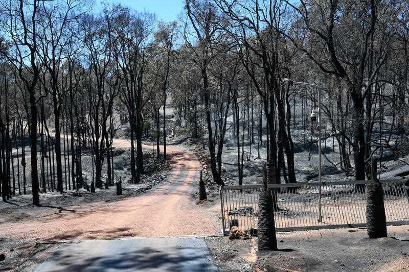 A burned fire ground is shown near Wooroloo, northeast of Perth.