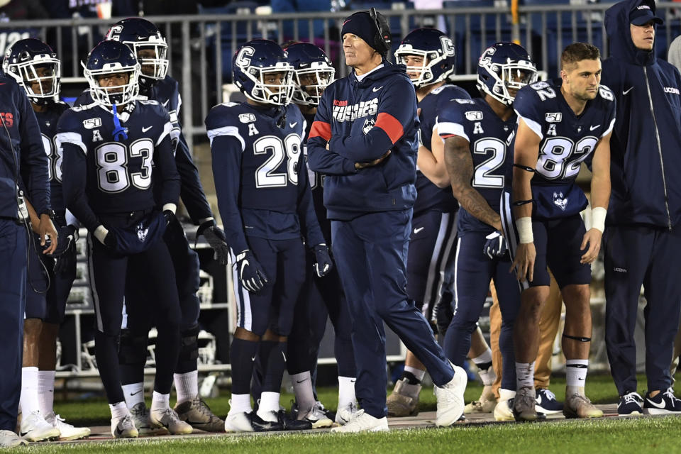 Connecticut coach Randy Edsall watches during the first half of the team's NCAA college football game against Navy on Friday, Nov. 1, 2019, in East Hartford, Conn. (AP Photo/Stephen Dunn)