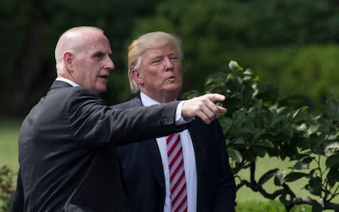 Keith Schiller with Donald Trump at the White House - Credit: AFP