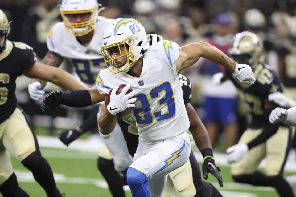 Los Angeles Chargers wide receiver Michael Bandy (83) runs up field during the first half of a preseason NFL football game against the New Orleans Saints in New Orleans, Friday, Aug. 26, 2022. (AP Photo/Butch Dill)